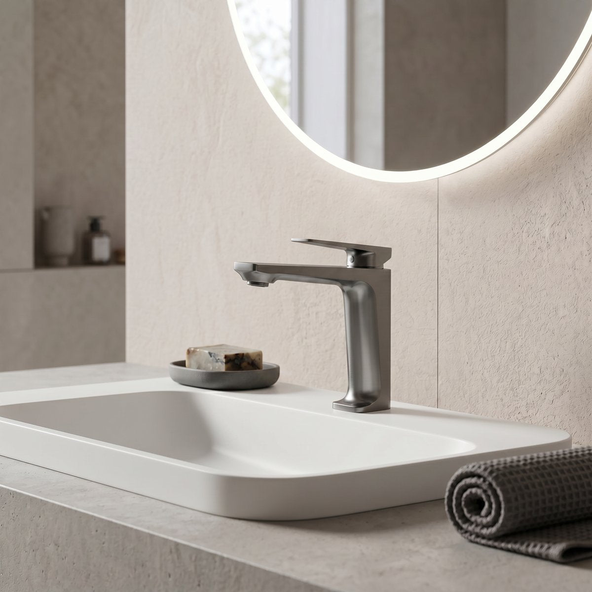 Mitigeur de lavabo gris brossé